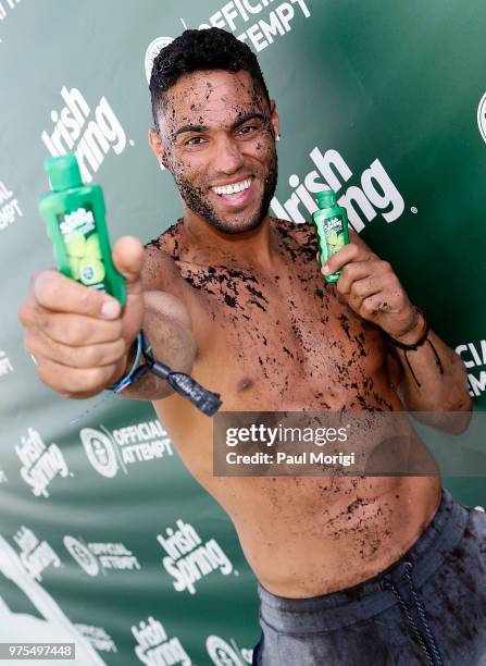 Ryan Klarenbach got dirty before lathering up to help Irish Spring break the Guinness World Records title for the Most People Showering...