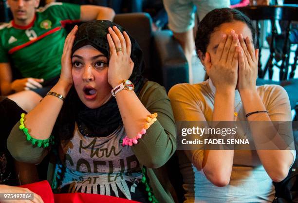 Moroccan football fans react while watching the Russia 2018 World Cup Group B match against Iran, on June 15 in Voronezh.