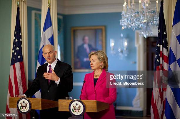 George Papandreou, prime minister of Greece, left, and Hillary Clinton, U.S. Secretary of state, hold a news conference at the State Department in...