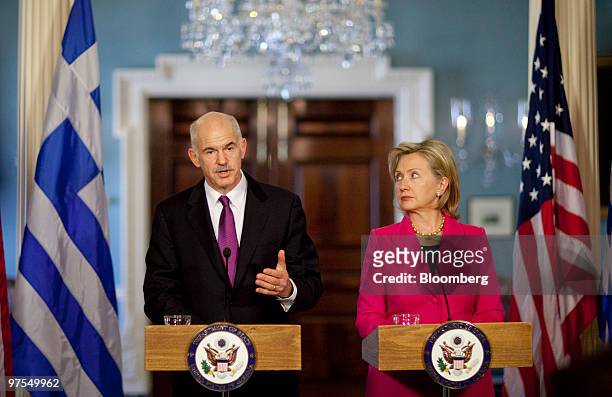 George Papandreou, prime minister of Greece, left, and Hillary Clinton, U.S. Secretary of state, hold a news conference at the State Department in...