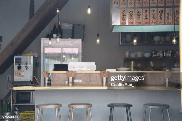 izakaya, japanese pub or japanese style restaurant - bar wall stock pictures, royalty-free photos & images