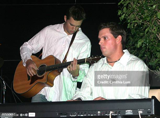 Mike Bryan and Bob Bryan play at the player party kicking off the 2006 Tennis Channel Open at the Mirage Hotel and Casino in Las Vegas, Nevada on...