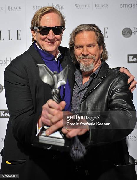 Musician T-Bone Burnett and actor Jeff Brdiges attend the ELLE Green Room at the 25th Film Independent Spirit Awards held at Nokia Theatre L.A. Live...