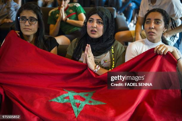 Moroccan football fans react while watching the Russia 2018 World Cup Group B match against Iran, on June 15 in Voronezh.