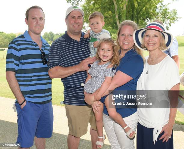 Brian Heimerdinger, Tim Pepe, Alicia Heimerdinger Pepe and Kathie Heimerdinger attend the 7th Annual Drive 4 Dinger Celebrity Golf Tournament at...