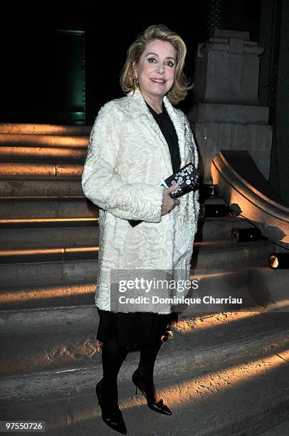 Catherine Deneuve attends the Yves Saint-Laurent Ready to Wear show as part of the Paris Womenswear Fashion Week Fall/Winter 2011 at Grand Palais on...