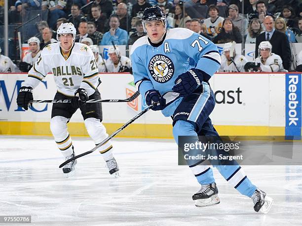 Evgeni Malkin of the Pittsburgh Penguins turns up ice in front of Loui Eriksson of the Dallas Stars on March 6, 2010 at Mellon Arena in Pittsburgh,...