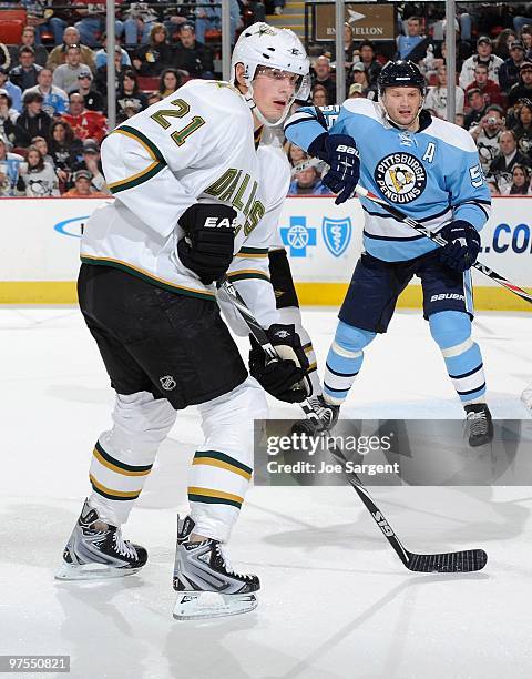 Loui Eriksson of the Dallas Stars skates in front of Sergei Gonchar of the Pittsburgh Penguins on March 6, 2010 at Mellon Arena in Pittsburgh,...