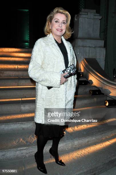 Catherine Deneuve attends the Yves Saint-Laurent Ready to Wear show as part of the Paris Womenswear Fashion Week Fall/Winter 2011 at Grand Palais on...