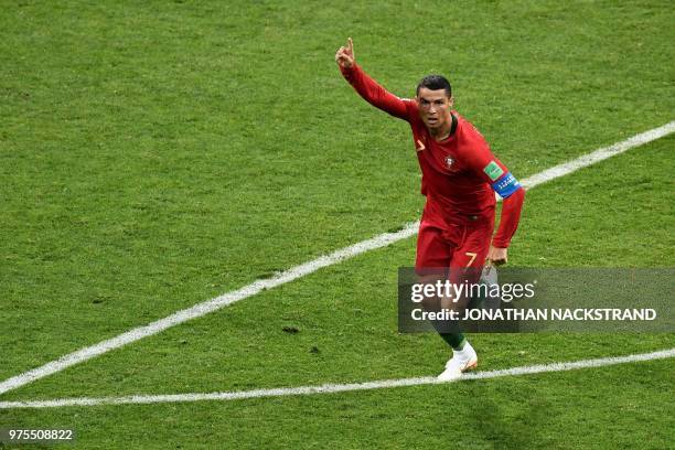 Portugal's forward Cristiano Ronaldo celebrates after scoring the second goal during the Russia 2018 World Cup Group B football match between...