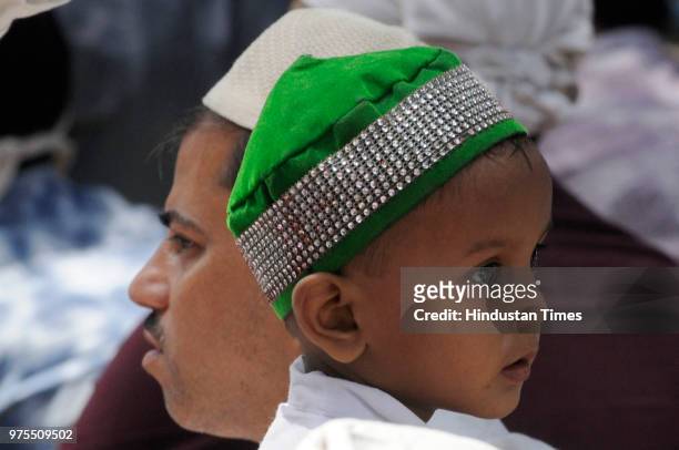 Boy before the last Friday namaz of the month of Ramzan in front of Tipu Sultan Mosque at Esplanade on June 15, 2018 in Kolkata, India.