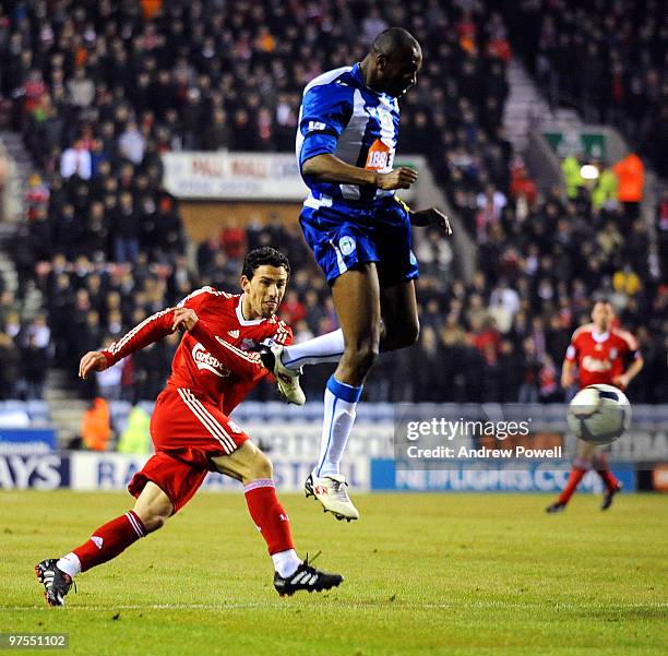 Maxi Rodriguez of Liverpool shoots during the Barclays Premier League match between Wigan Athletic and Liverpool at the DW Stadium on March 8, 2010...