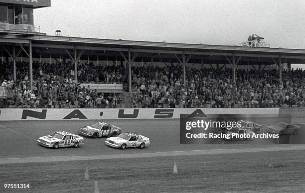 Bobby Allison leads Terry Labonte and Neil Bonnett around the 100th lap. Allison would finish in first place and take home $120,630 for the race.