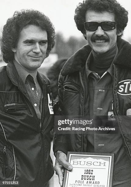 Morgan Shepherd takes a few pictures with Richard Petty after Petty won the second Round Fasted Qualifier in Bristol.