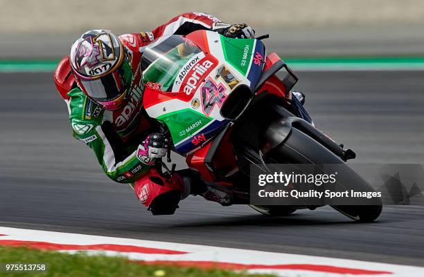 Aleix Espargaro of Spain and Aprilia Racing Team Gresini of Great Britain and Aprilia Racing Team Gresini rounds the bend during free practice for...