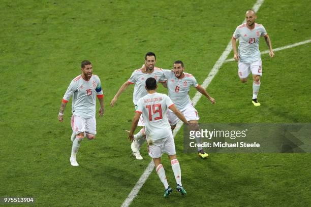 Diego Costa of Spain celebrates after scoring his team's second goal with team mates during the 2018 FIFA World Cup Russia group B match between...