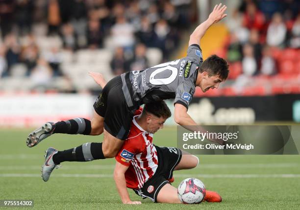 Londonderry , United Kingdom - 15 June 2018; Ben Doherty of Derry City in action against Jamie McGrath of Dundalk during the SSE Airtricity League...