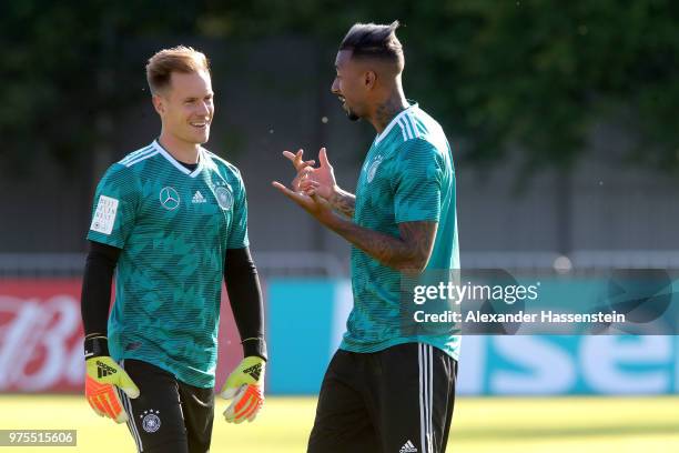 Jerome Boateng of Germany jokes with his team mate Marc-Andre ter-Stegen during the Germany training session ahead of the 2018 FIFA World Cup at CSKA...