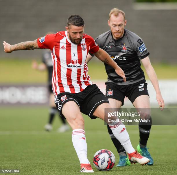Londonderry , United Kingdom - 15 June 2018; Rory Patterson of Derry City in action against Chris Sheilds of Dundalk during the SSE Airtricity League...