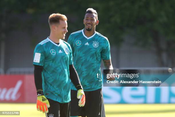 Jerome Boateng of Germany jokes with his team mate Marc-Andre ter-Stegen during the Germany training session ahead of the 2018 FIFA World Cup at CSKA...