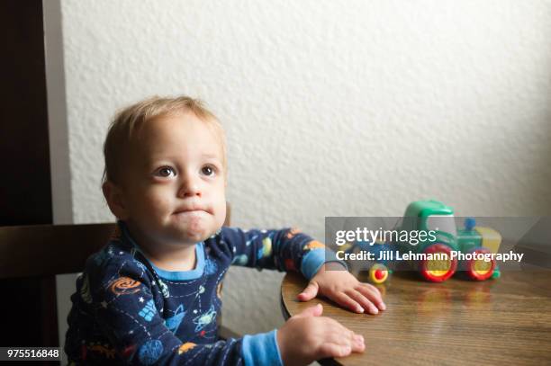 portrait of a male toddler experiencing hand mouth and foot disease - male feet imagens e fotografias de stock