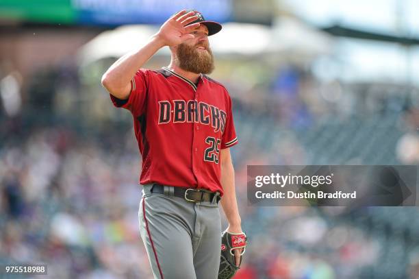 Archie Bradley of the Arizona Diamondbacks celebrates after an 8-3 win over the Colorado Rockies at Coors Field on June 10, 2018 in Denver, Colorado.