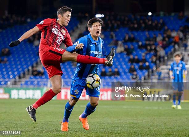 Shanghai FC Midfielder Odil Akhmedov fights for the ball with Ulsan Midfielder Park Joo-Ho during the AFC Champions League 2018 Group Stage F Match...