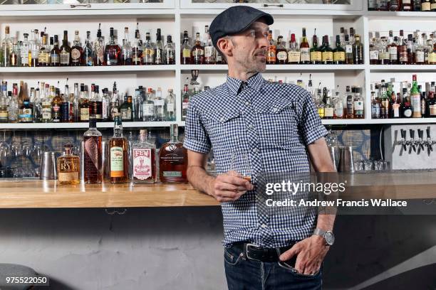 Ryan Ringer of Grey Tiger, who has over 100 bottles of whisky at his bar. For Life story on Canadian bourbons to try instead of the Kentucky bourbons...