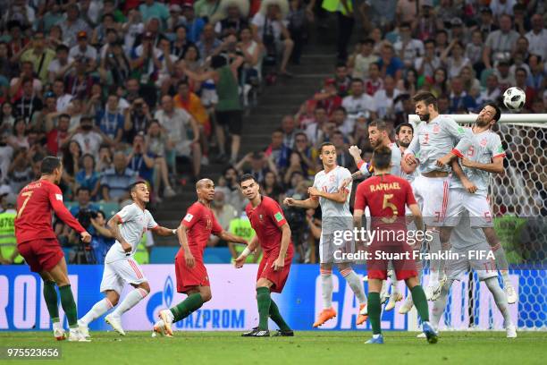 Cristiano Ronaldo of Portugal scores a free-kick for his team's third goal during the 2018 FIFA World Cup Russia group B match between Portugal and...