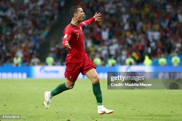 Cristiano Ronaldo of Portugal celebrates after scoring his team's third goal during the 2018 FIFA World Cup Russia group B match between Portugal and...
