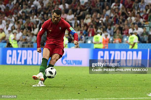 Portugal's forward Cristiano Ronaldo celebrates his third goal during the Russia 2018 World Cup Group B football match between Portugal and Spain at...