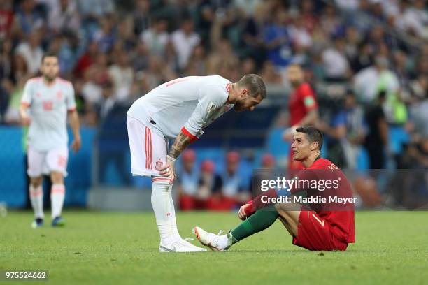 Cristiano Ronaldo of Portugal talks to Sergio Ramos of Spain during the 2018 FIFA World Cup Russia group B match between Portugal and Spain at Fisht...