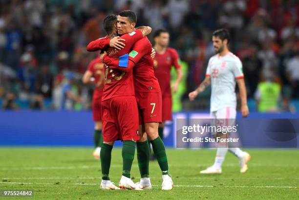 Ricardo Quaresma of Portugal and team mate Cristiano Ronaldo embrace following the 2018 FIFA World Cup Russia group B match between Portugal and...