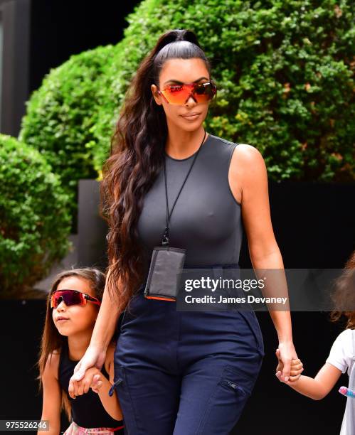 North West and Kim Kardashian seen on the streets of Manhattan on June 15, 2018 in New York City.