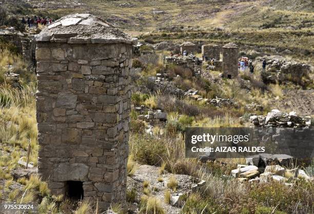 Picture of a restored pre-Inca funerary tower known as chullpa, erected at the Qala Uta archaeological site near Quehuaya, on the slopes of the hills...