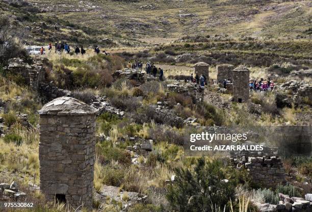 Picture showing restored pre-Inca funerary towers known as chullpas, erected at the Qala Uta archaeological site near Quehuaya, on the slopes of the...