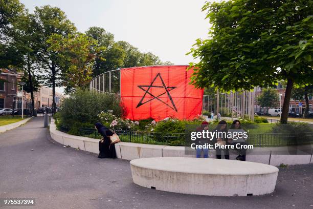 Large Moroccan flag is hung in Schilderswijk, a neighborhood in The Hague where the Dutch-Moroccan community are supporting the Moroccan national...