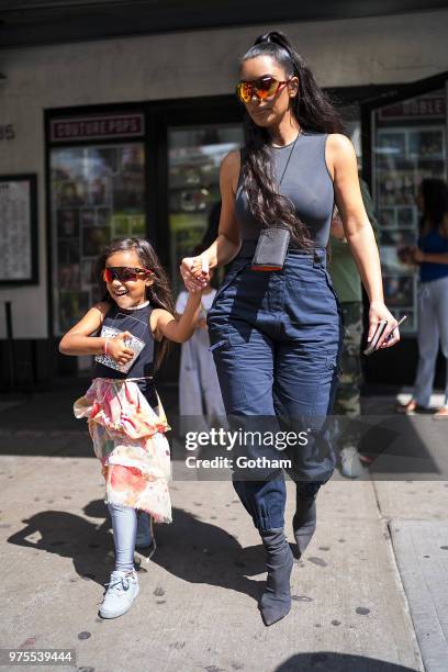 North West and Kim Kardashian are seen in the Meat Packing District on June 15, 2018 in New York City.