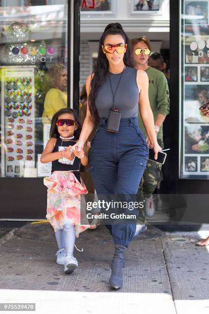 North West and Kim Kardashian are seen in the Meat Packing District on June 15, 2018 in New York City.