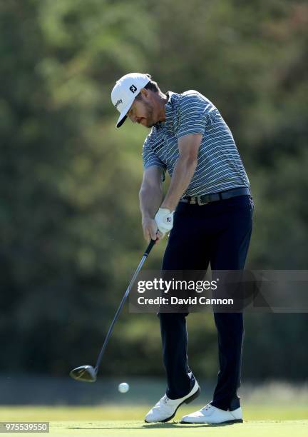 Jimmy Walker of the United States plays his tee shot on the sixth hole during the first round of the 2018 US Open at Shinnecock Hills Golf Club on...