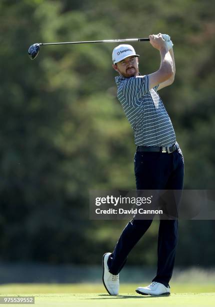 Jimmy Walker of the United States plays his tee shot on the sixth hole during the first round of the 2018 US Open at Shinnecock Hills Golf Club on...