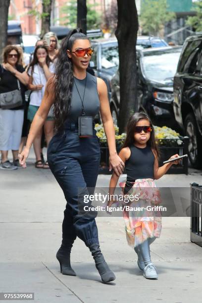 Kim Kardashian and her daughter, North West are seen on June 15, 2018 in New York City.