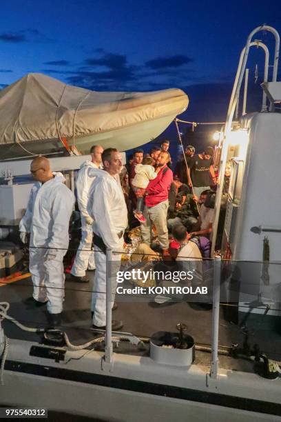 Moment of the landing of 48 Syrian refugees landed at the Port of Crotone in the night, transported by a patrol boat of the Guardia di Finanza of...