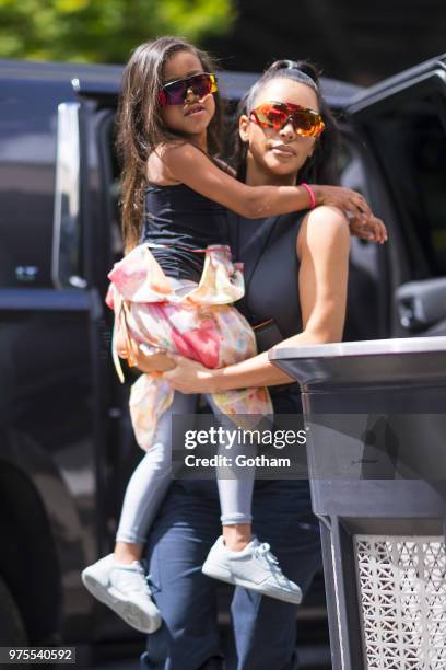 North West and Kim Kardashian are seen in the Meat Packing District on June 15, 2018 in New York City.