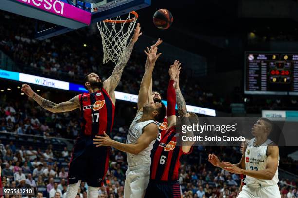 Felipe Reyes, #9 forward of Real Madrid and Janis Timma, #6 forward of Kirolbet Baskonia during the Liga Endesa game between Real Madrid and Kirolbet...