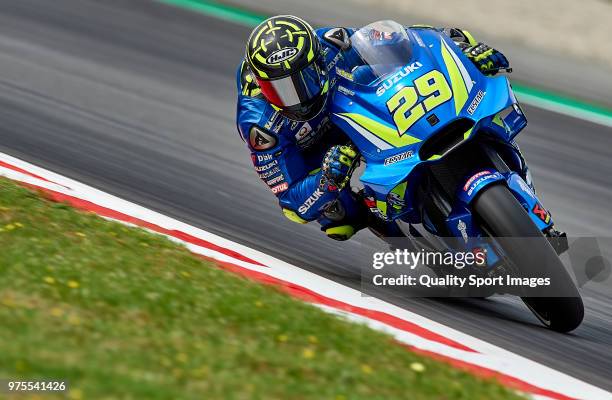 Andrea Iannone of Italy and Team Suzuki Ecstar rounds the bend during free practice for the MotoGP of Catalunya at Circuit de Catalunya on June 15,...