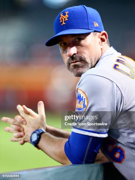 New York Mets manager Mickey Callaway stands in the dugout during the MLB baseball game between the Arizona Diamondbacks and the New York Mets on...