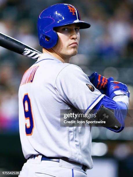 New York Mets center fielder Brandon Nimmo warms up in the on-deck circle during the MLB baseball game between the Arizona Diamondbacks and the New...