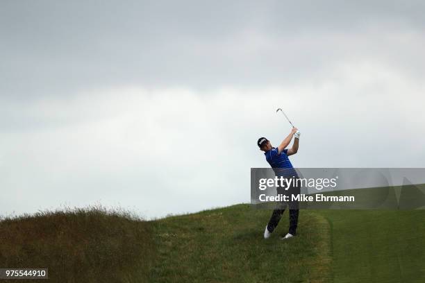 Branden Grace of South Africa plays an approach shot on the 10th hole during the second round of the 2018 U.S. Open at Shinnecock Hills Golf Club on...