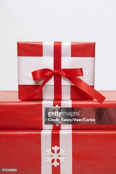 stack of gifts - climat stock pictures, royalty-free photos & images